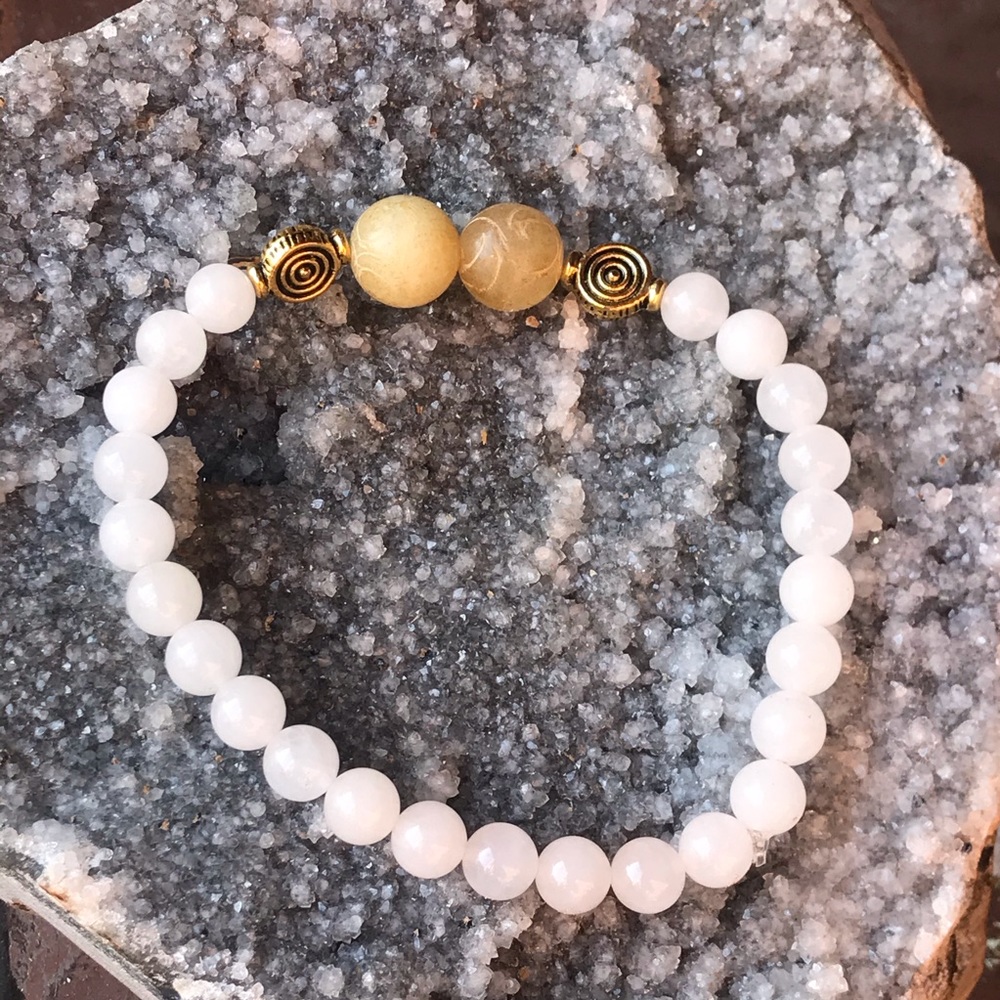 White jade and carved yellow jade bracelet